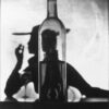 Irving Penn, Girl Behind Bottle (Jean Patchett), 1949 © The Irving Penn Foundation, courtesy of Pace Gallery