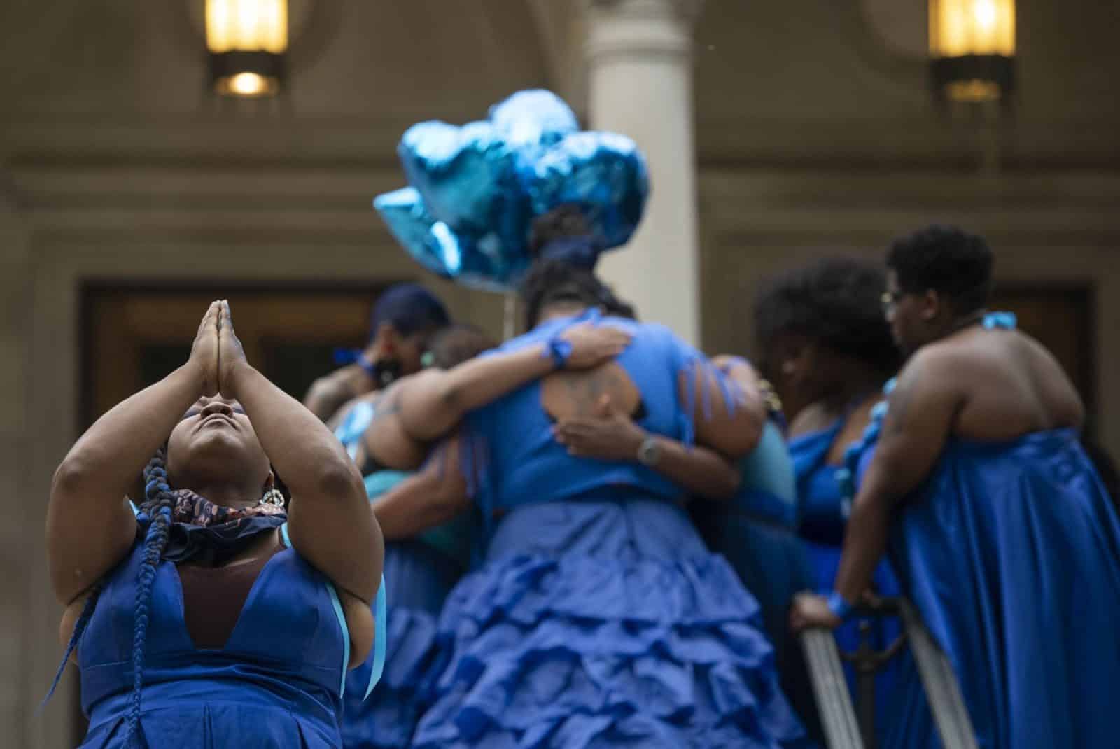 vanessa german leads The Blue Walk in Pittsburgh, PA, 2021. Copyright ©, Pittsburgh Post-Gazette, 2021, all rights reserved. Reproduced with permission.