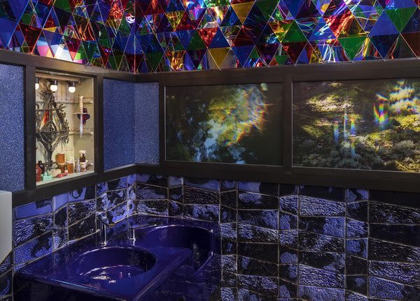 Detail of Joy Feasley and Paul Swenbeck's Listen, the Snow Is Falling washroom installation at the Art Preserve, 2021. Photo courtesy of John Michael Kohler Arts Center.