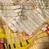 El Anatsui, (detail), 2021, aluminium and copper wire, 280 x 807cm- Courtesy the Artist and October Gallery, London
