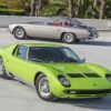 1969 Lamborghini Miura P400S (front), estimate $1,750,000-2,250,000 and its sibling 1966 Lamborghini 350 GT, estimate $550,000-750,000