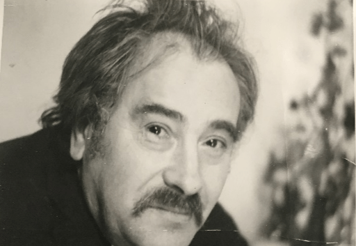 A picture containing text, posing, picture frameDescription automatically generated