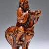 A wood Netsuke of a mounted Chinese horseman by Hoshin, Kyoto, late 18th century sold for €127,400